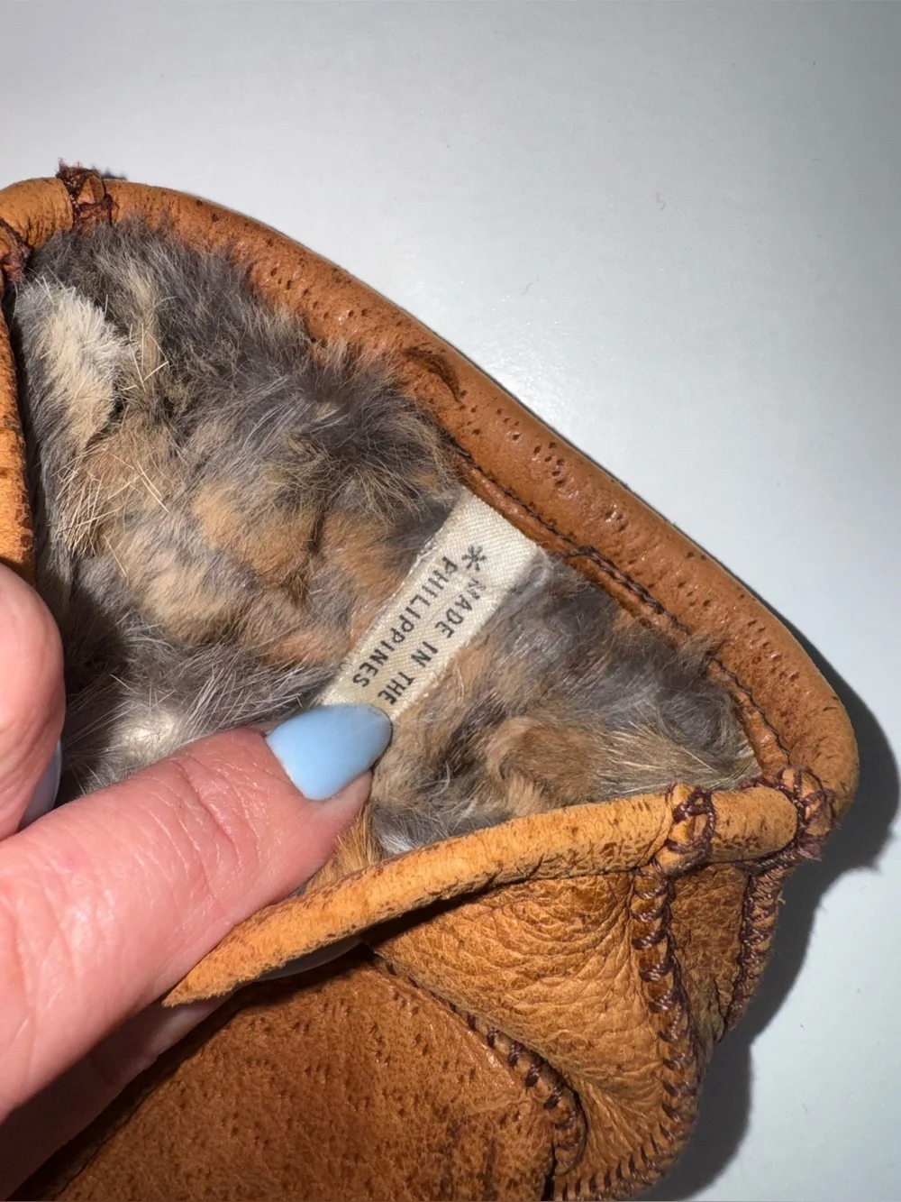 Brown Leather gloves with rabbit fur lining.